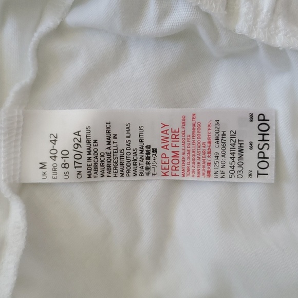 Romper NWOT with ruffle and trim. Topshop - Picture 7 of 8